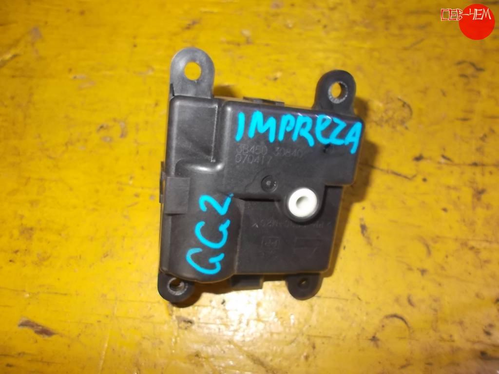 моторчик привода заслонок печки Subaru Impreza