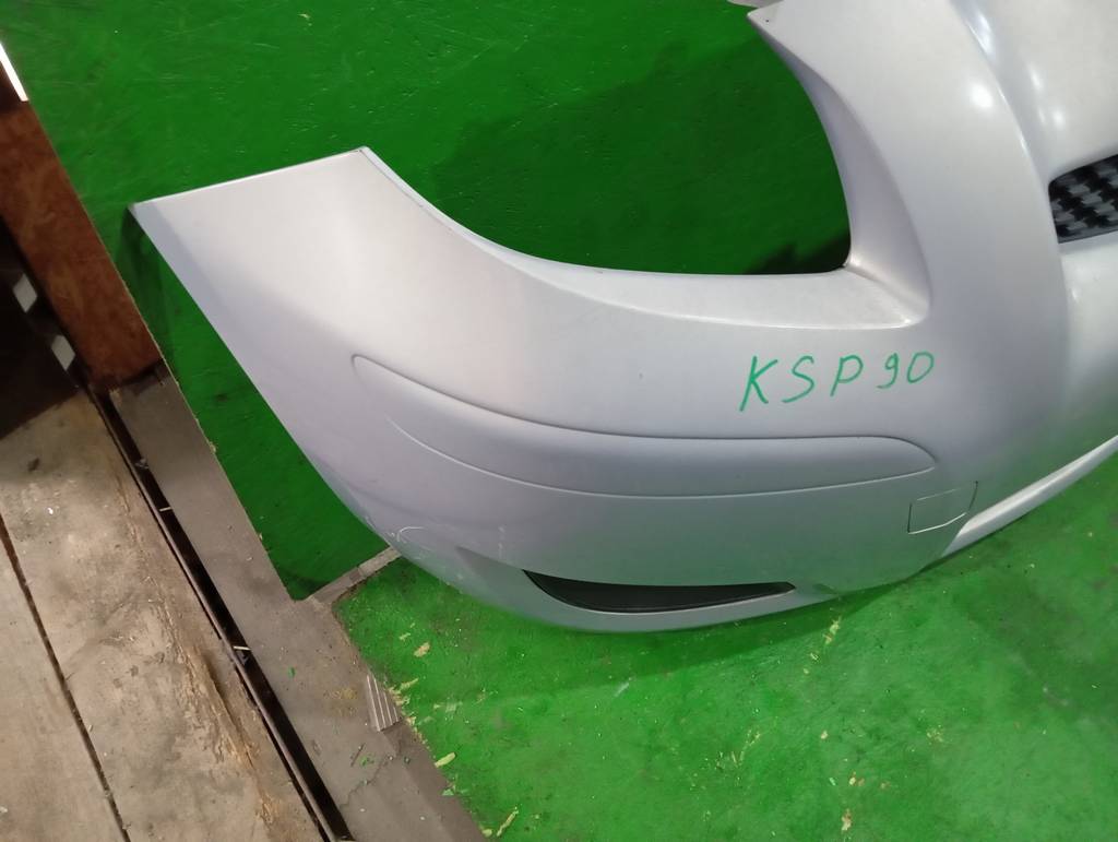 VITZ KSP90 БАМПЕР ПЕРЕДНИЙ С РЕШЕТКОЙ Toyota Vitz