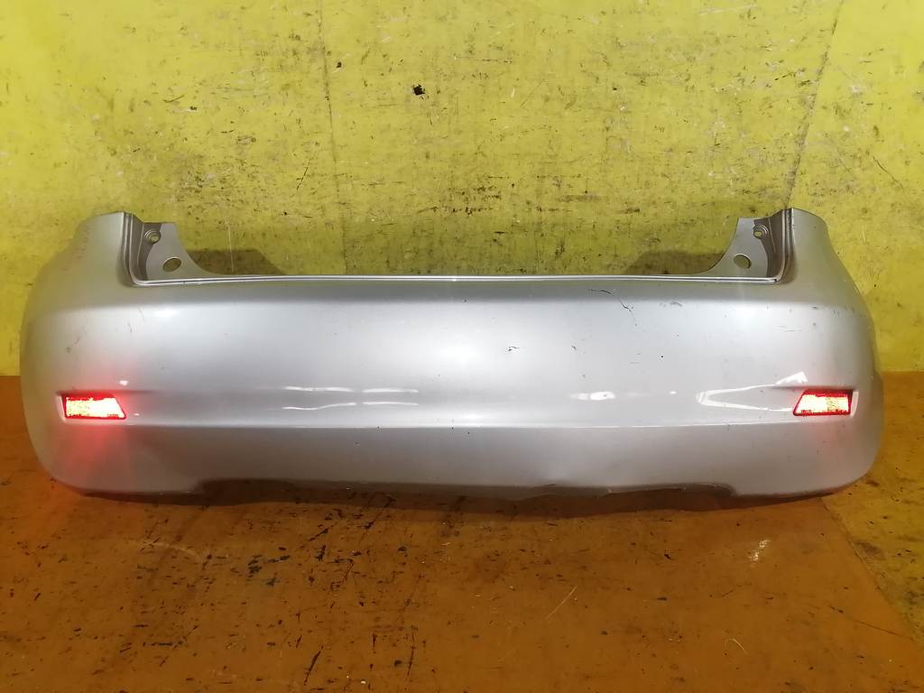 бампер Nissan Note