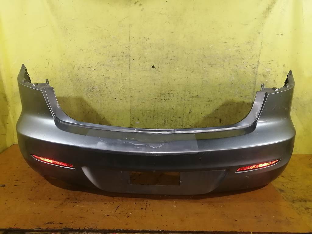 бампер Mazda Axela