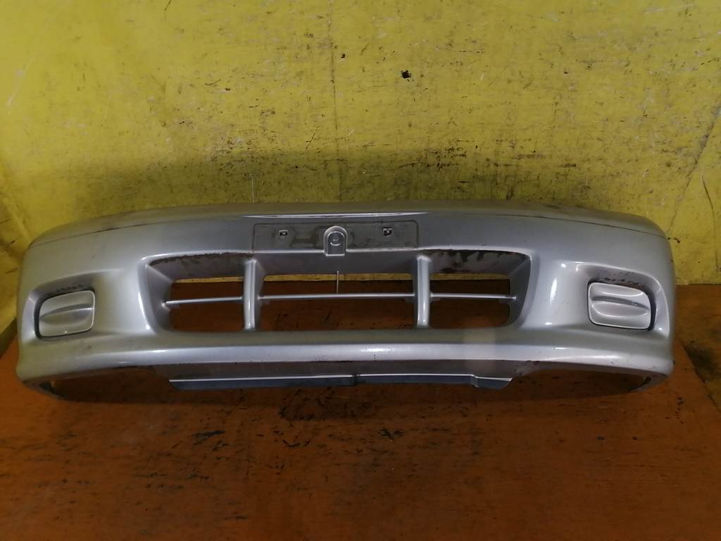 бампер Mazda Demio 0