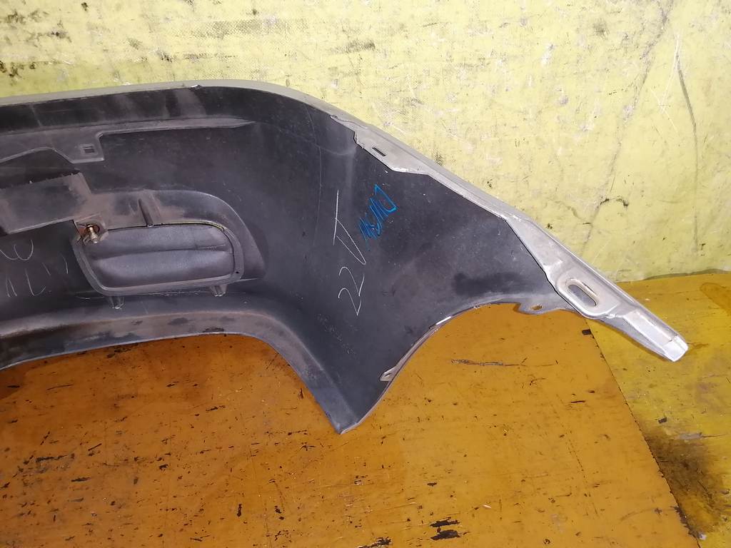 бампер Mazda Demio 6