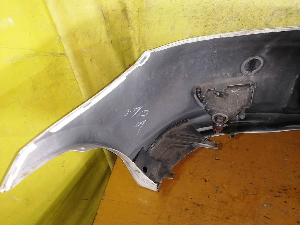 бампер Mazda Demio 9