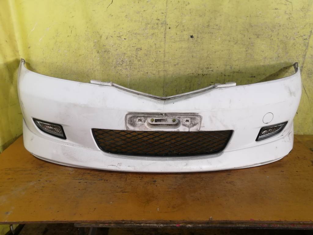 бампер Mazda Demio 0