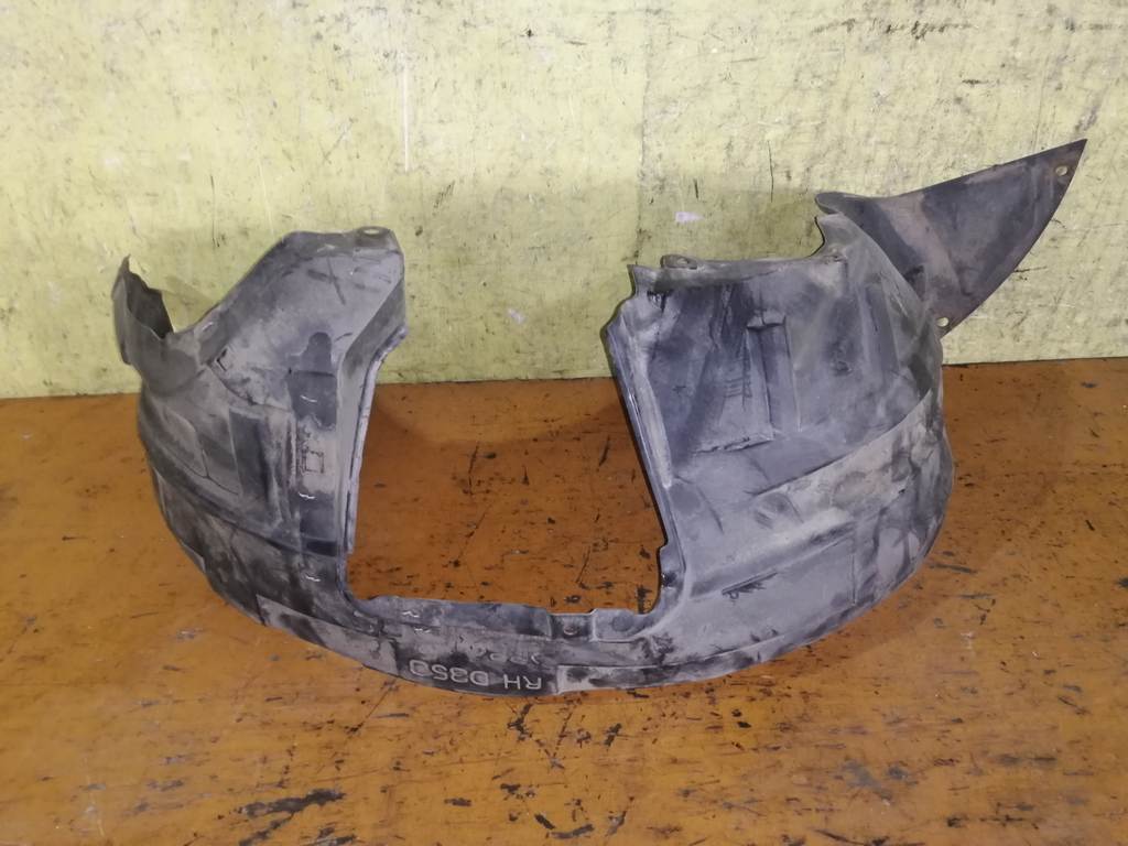 подкрылок Mazda Demio 0