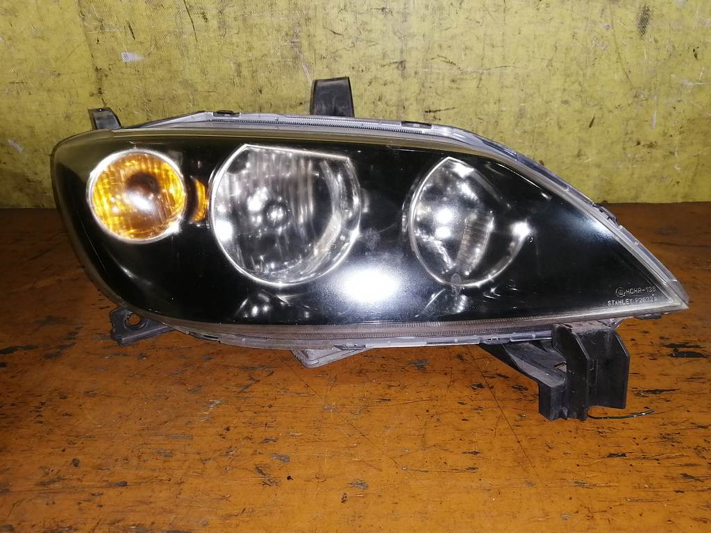 фара Mazda Demio 0