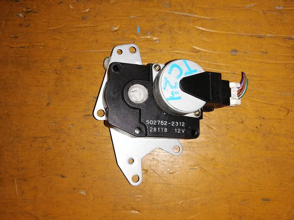 сервопривод заслонок печки Nissan Serena 0