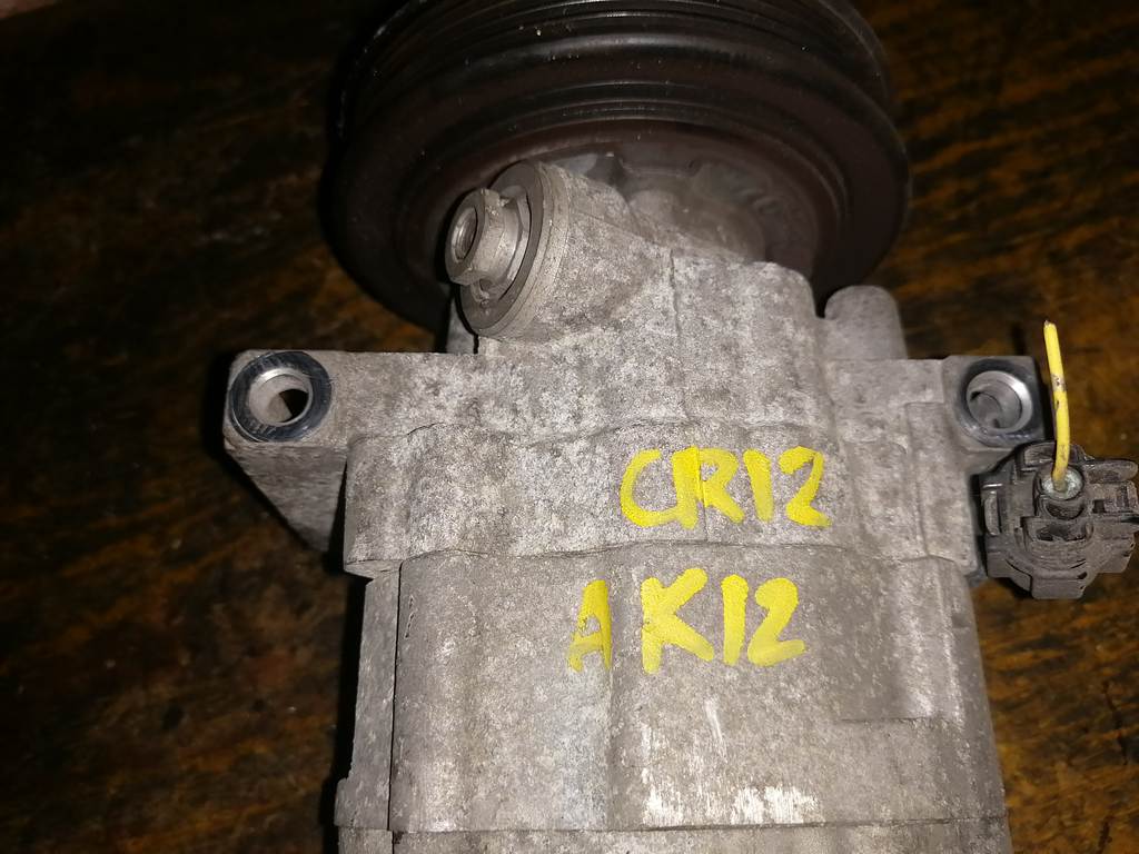 CR12DE КОМПРЕССОР КОНДИЦИОНЕРА 92600 AX02A Nissan March 1