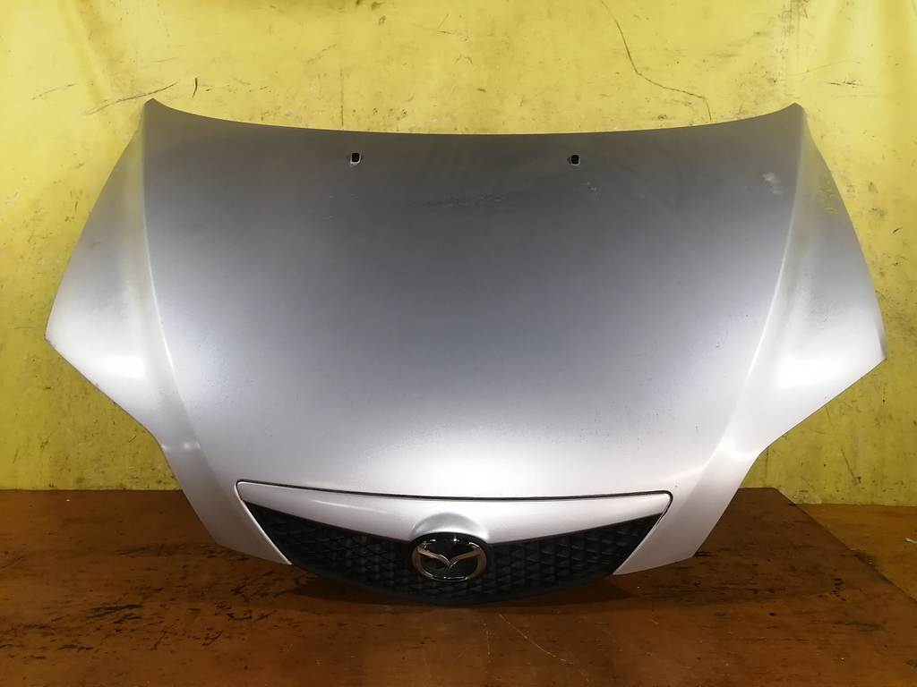 капот Mazda Demio 0