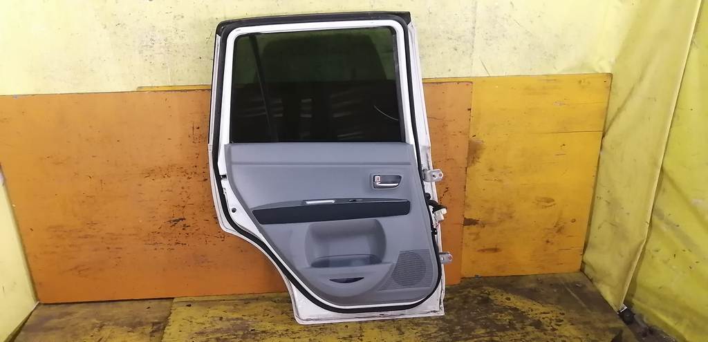 дверь Mazda Demio 3