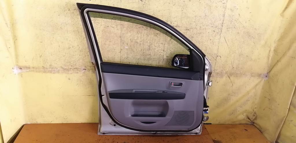 дверь Mazda Demio 3