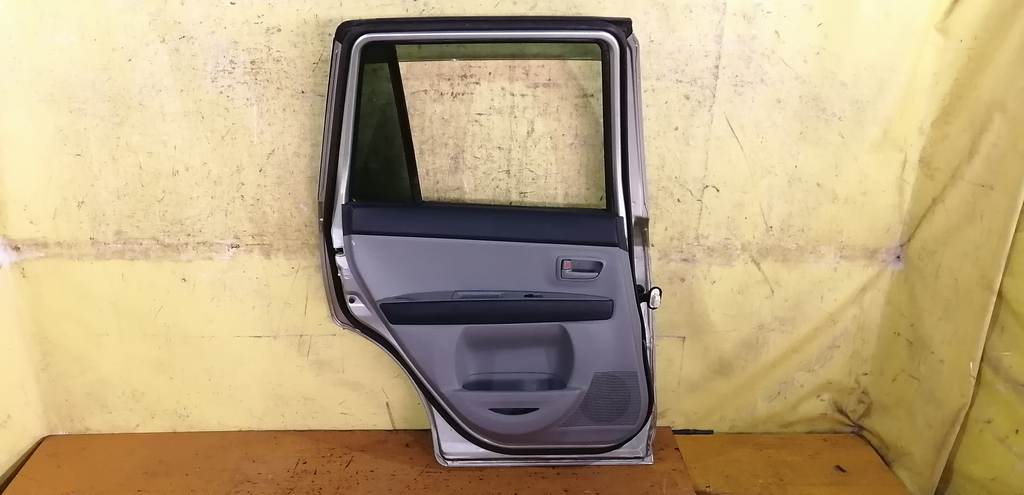 дверь Mazda Demio 3