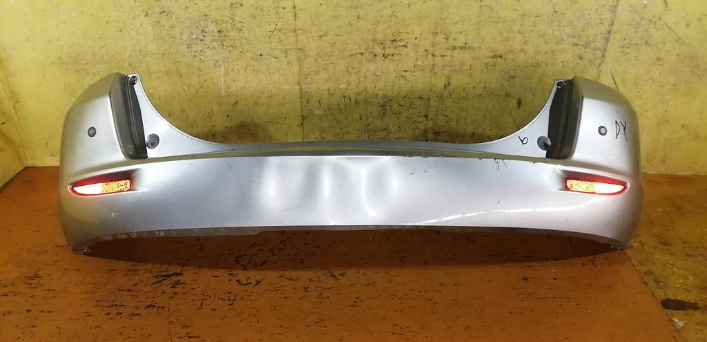 бампер Mazda Demio 0