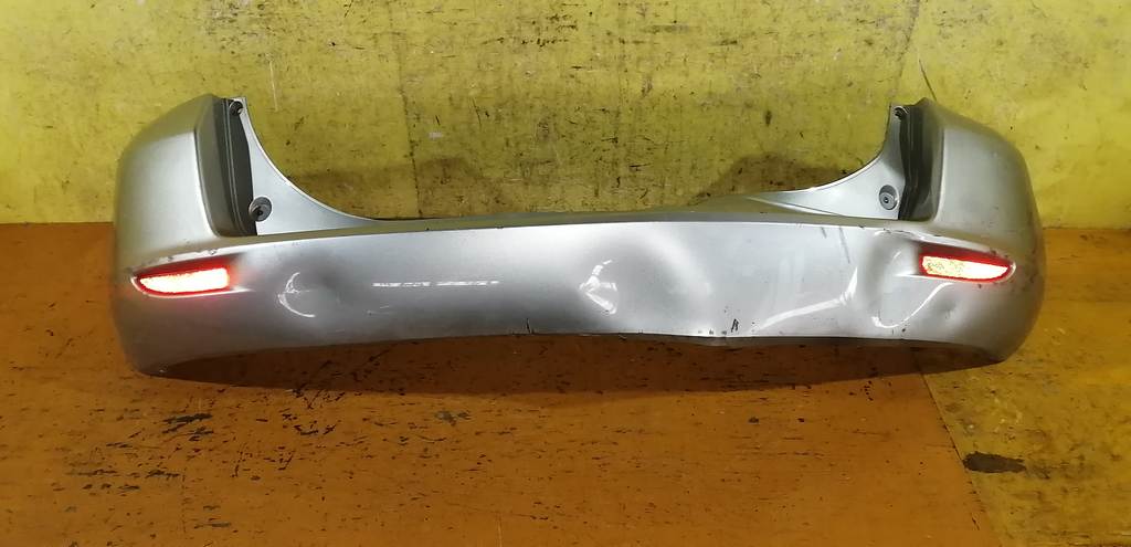 бампер Mazda Demio 0