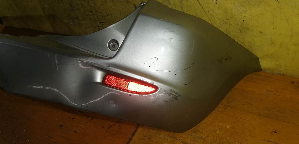 бампер Mazda Demio 3