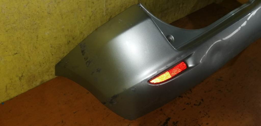 DEMIO DY5W БАМПЕР ЗАДНИЙ, дефект Mazda Demio 1