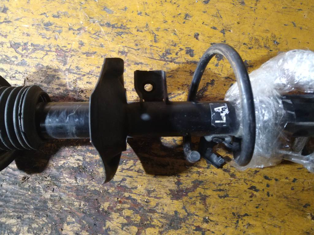 стойка Nissan Note 3