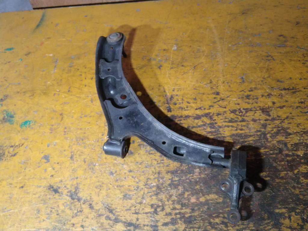 рычаг Nissan Sunny 3