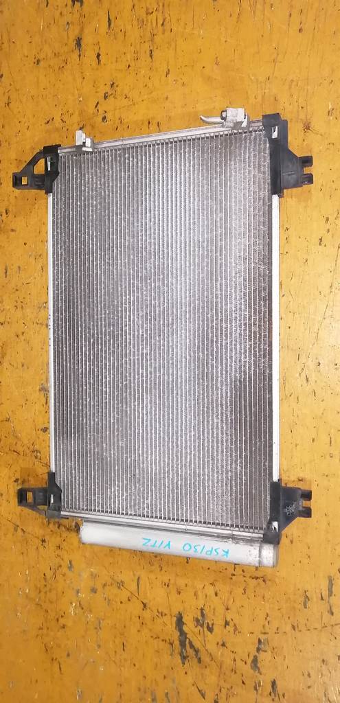 радиатор кондиционера Toyota Vitz 0