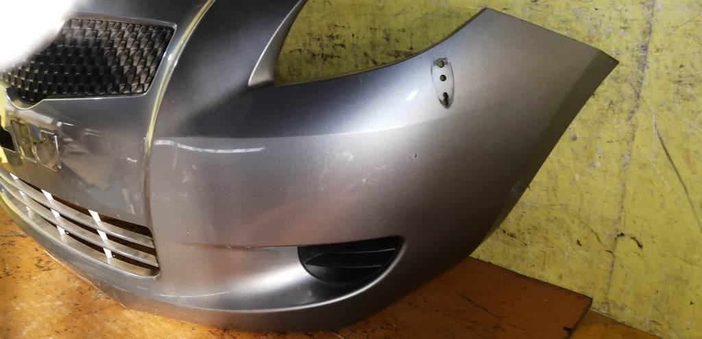 бампер Toyota Vitz 6