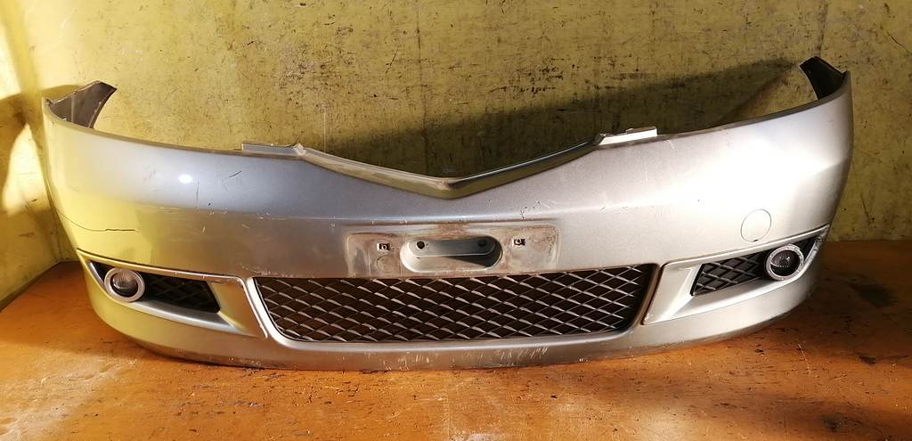 бампер Mazda Demio 0