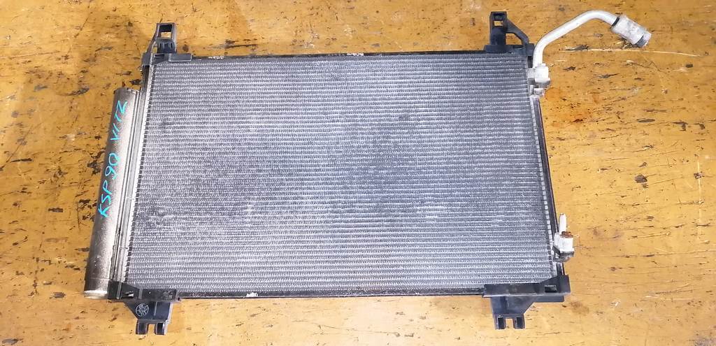 радиатор кондиционера Toyota Vitz 0