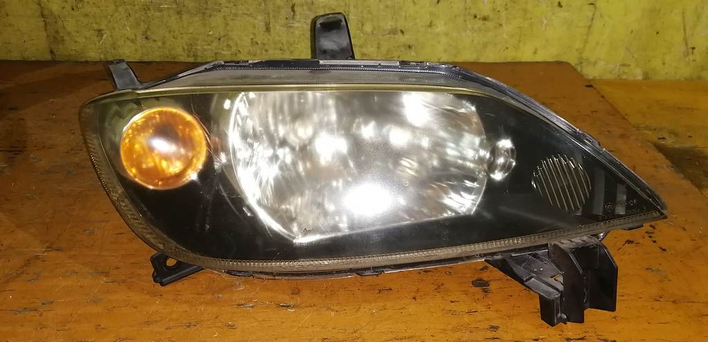 фара Mazda Demio 0