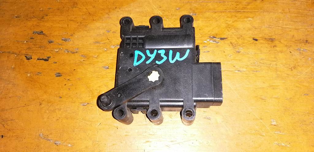 сервопривод заслонок печки Mazda Demio 0