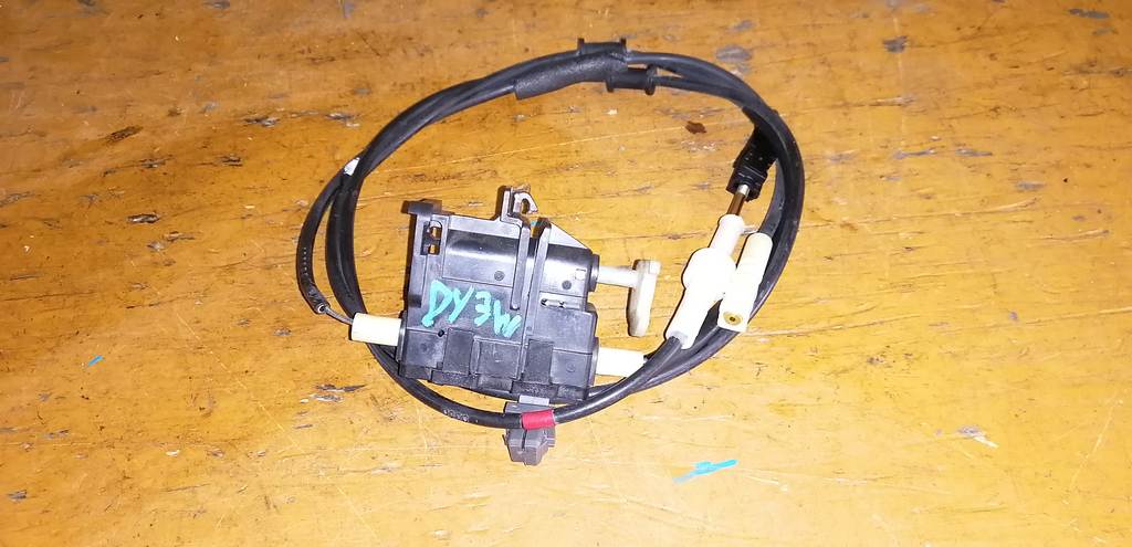 трос замка зажигания   Mazda Demio 0