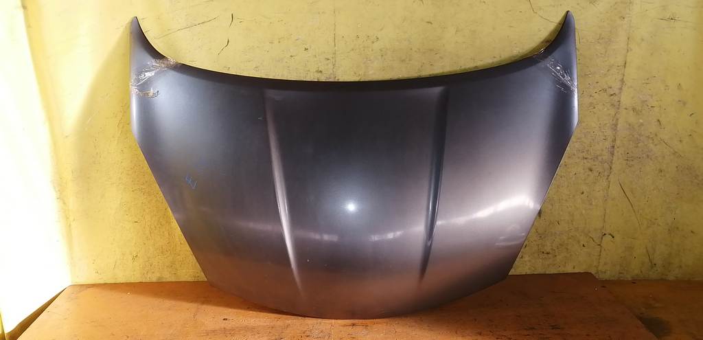 капот Nissan Note 0