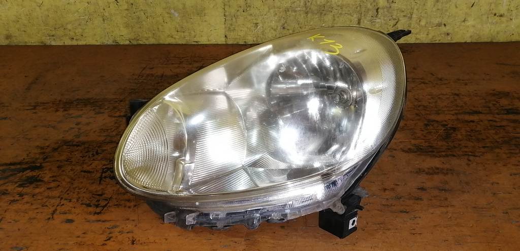 фара Nissan March 0