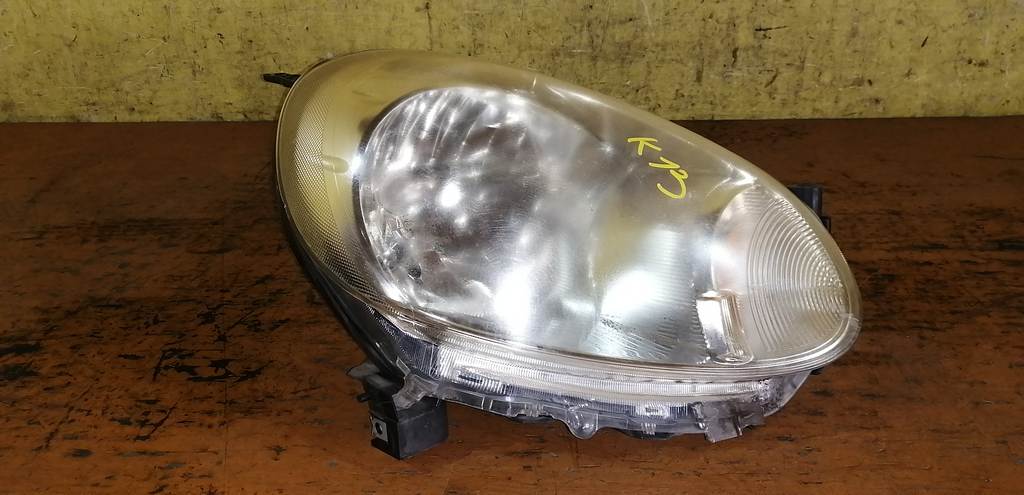 фара Nissan March 0