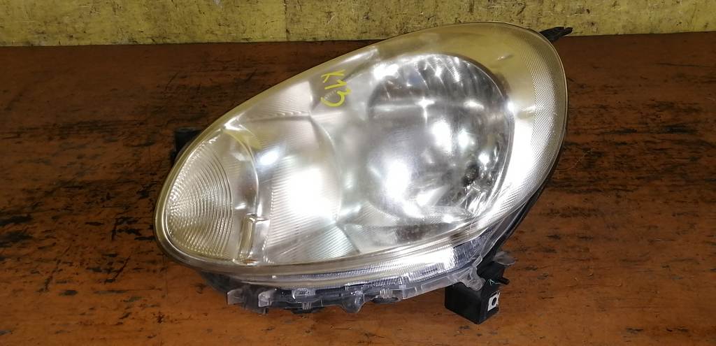 фара Nissan March 0