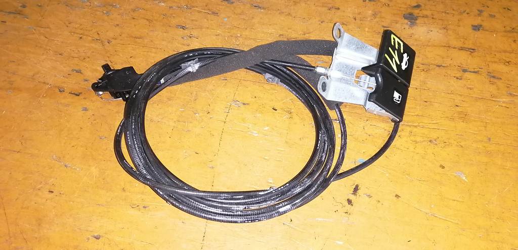 тросик лючка бака Nissan Note 0