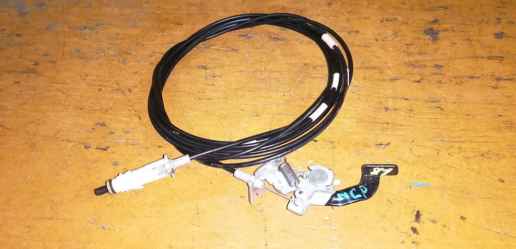 тросик лючка бака Toyota Sienta 0