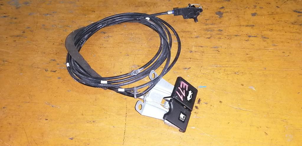 тросик лючка бака Nissan Note 0