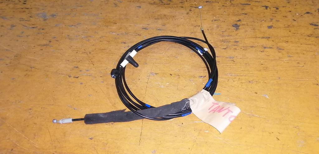 тросик лючка бака Daihatsu Tanto 0