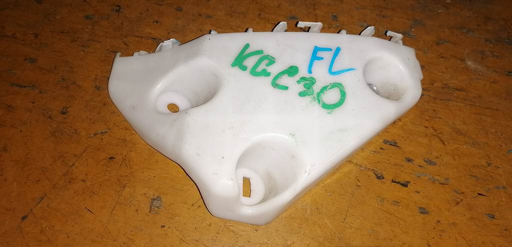 крепеж бампера Toyota Passo 0