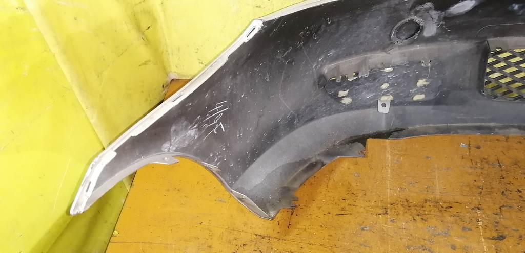 бампер Mazda Demio 9