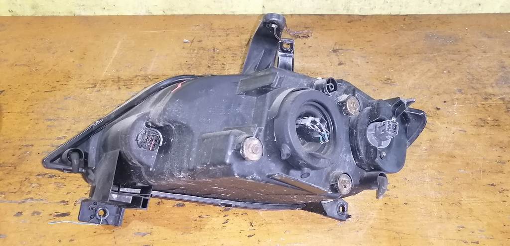 фара Mazda Demio 3