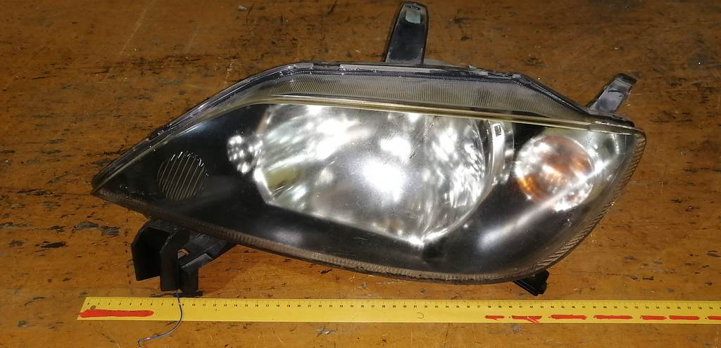 фара Mazda Demio 0