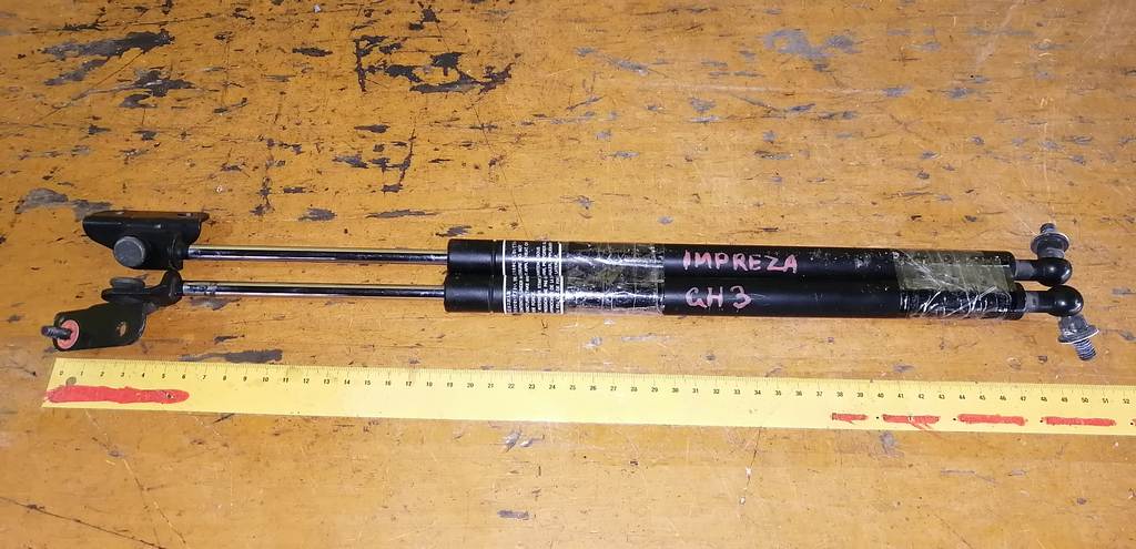 амортизатор двери Subaru Impreza 0