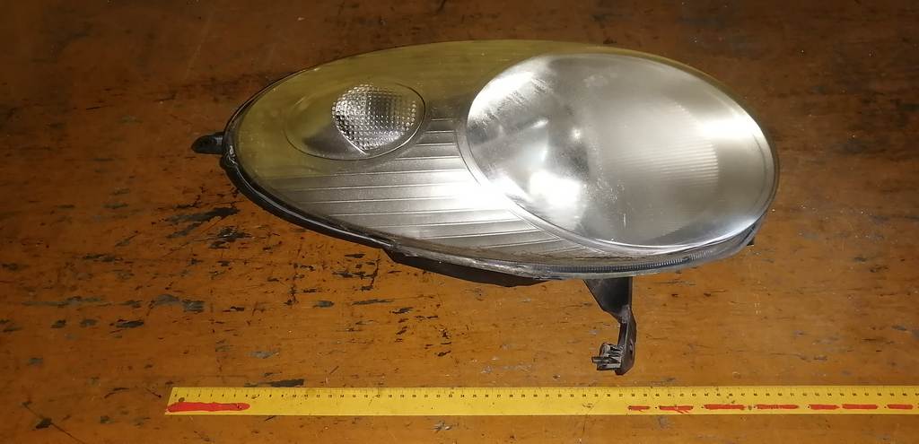 фара Nissan March 0