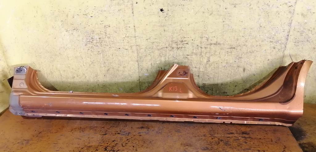 порог Nissan March 0