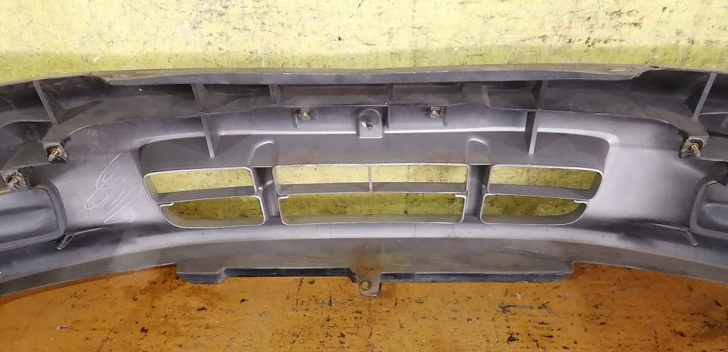 бампер Mazda Demio 9