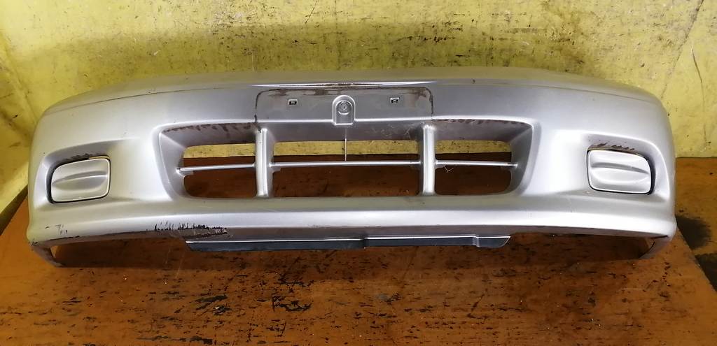 бампер Mazda Demio 0