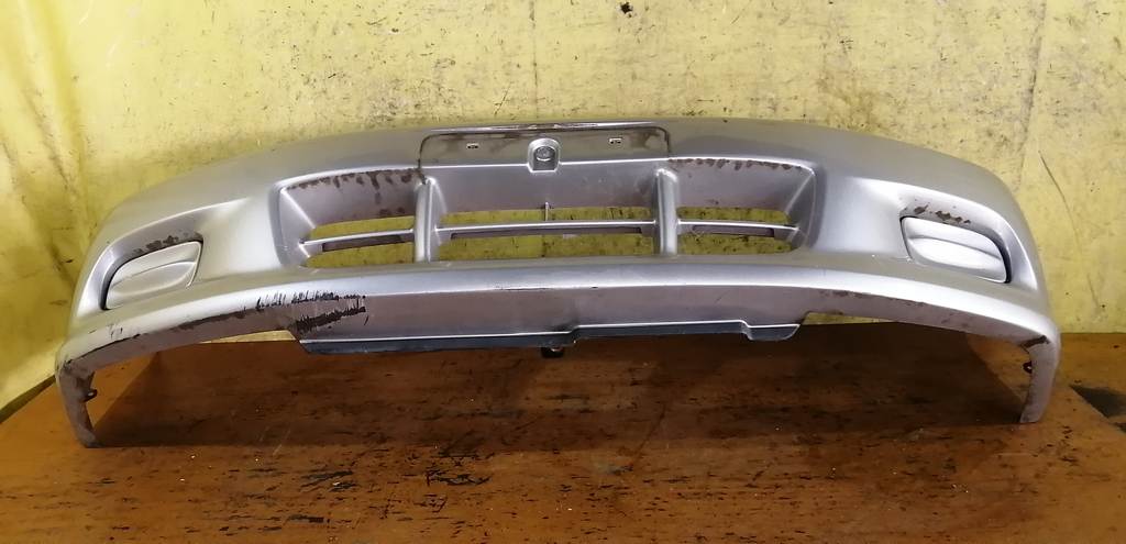 бампер Mazda Demio 6