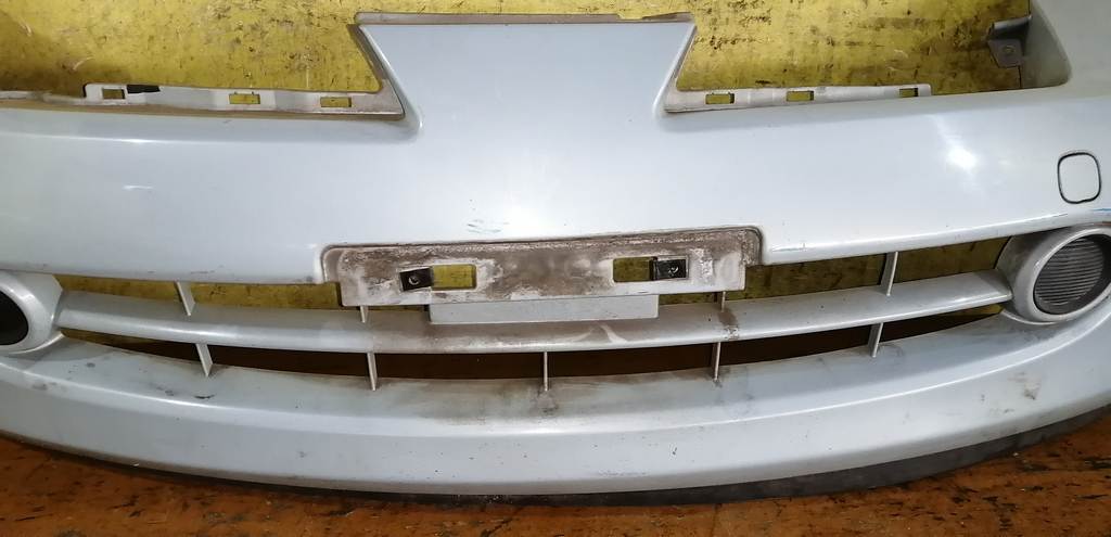 бампер Nissan March 3