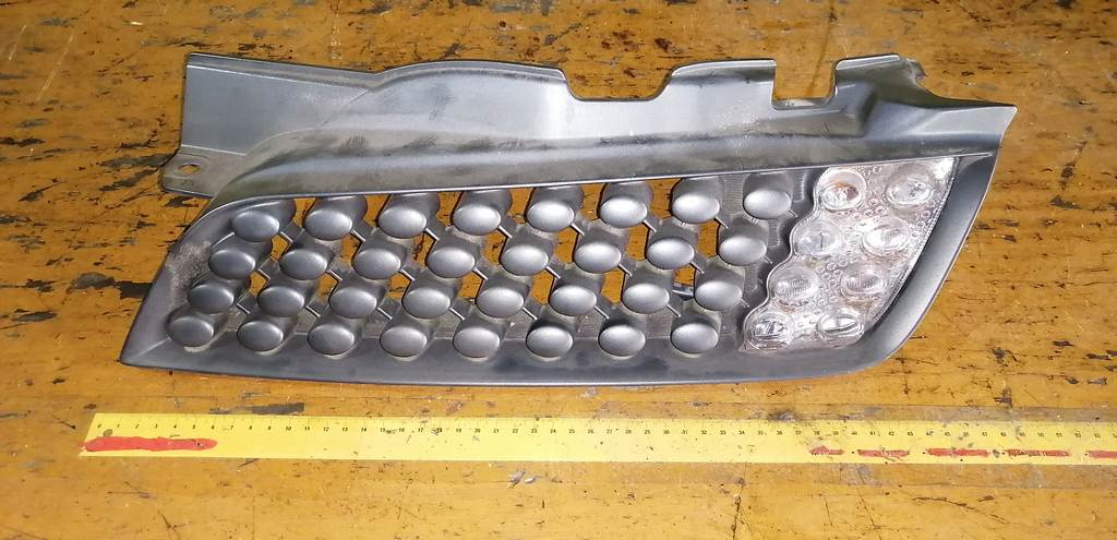 решетка радиатора Nissan March 0