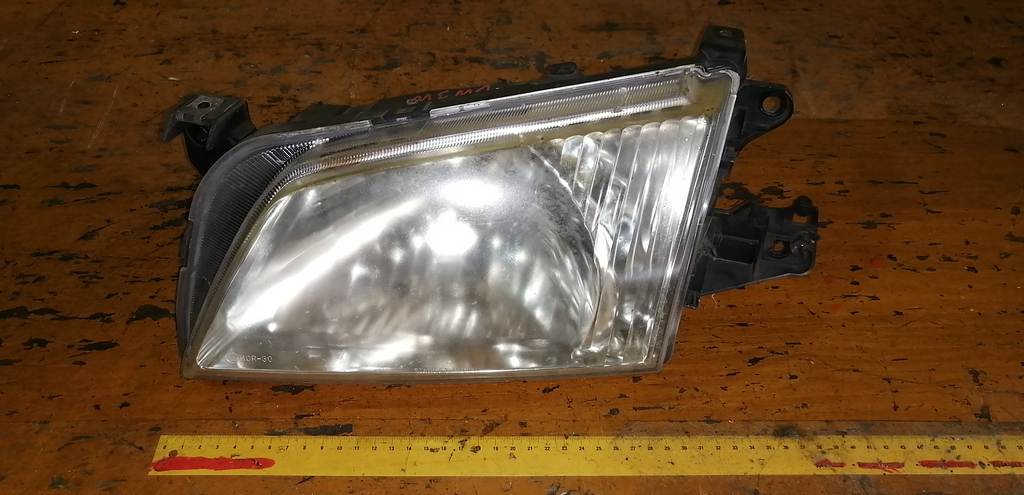 фара Mazda Demio 0